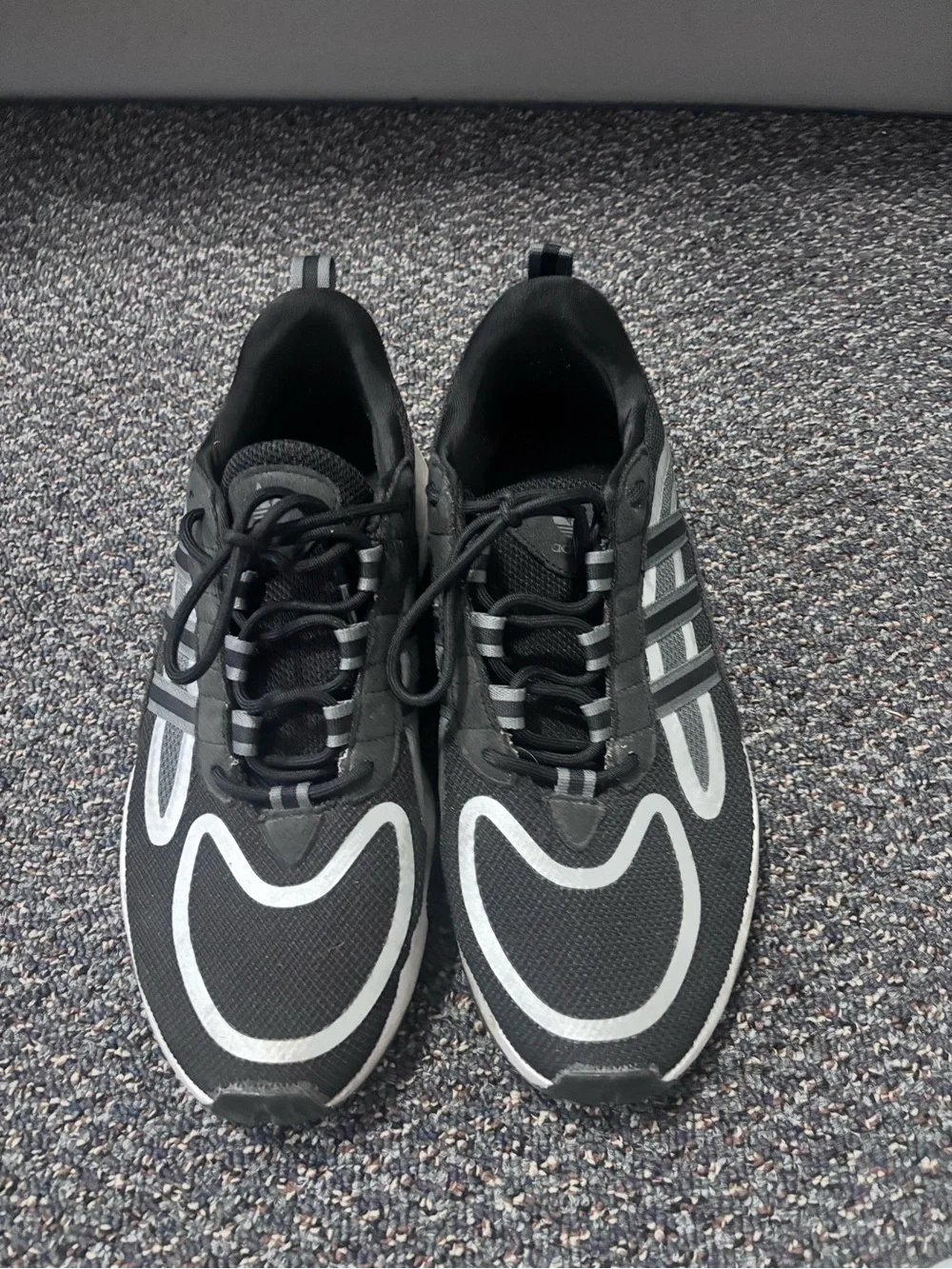 adidas Black Sneakers with Silver Reflective Detailing